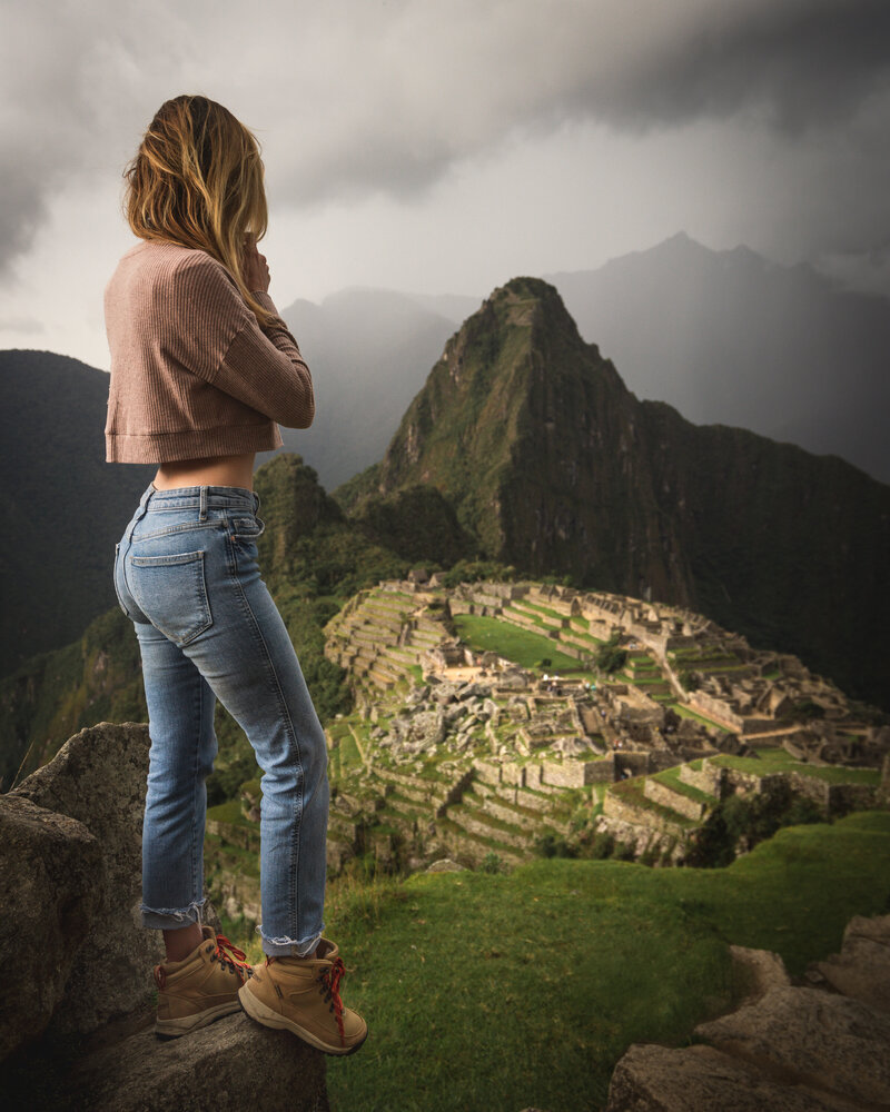 Jess of Jess Wandering standing at the top of Machu Picchu looking down