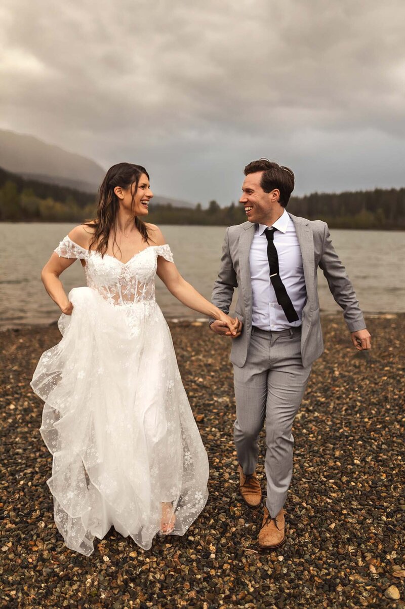 Capture the essence of your love with Everest Portraits as you walk hand-in-hand and share kisses beside the serene rivers of Western Washington. Our photography beautifully reflects your connection against the backdrop of stunning natural landscapes, ensuring your special moments are treasured forever.
