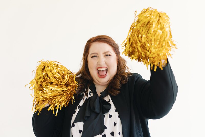 woman with big smile and confetti falling around her