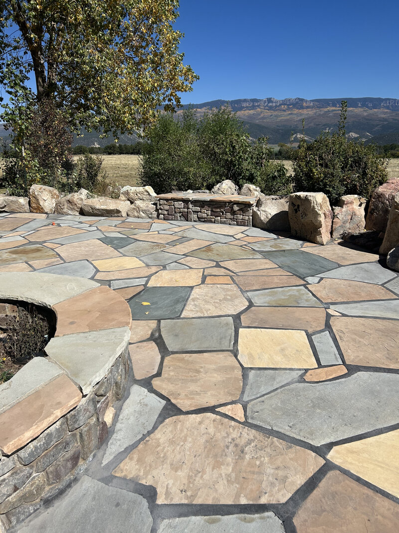 Western Colorado Montrose estate remodel with expert landscaping and stone pathways
