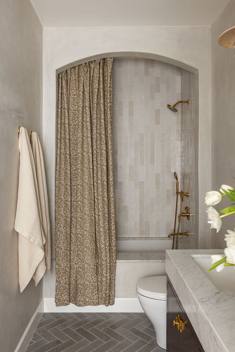 Contemporary bathroom design with vertical tile and warm textures in Southern California