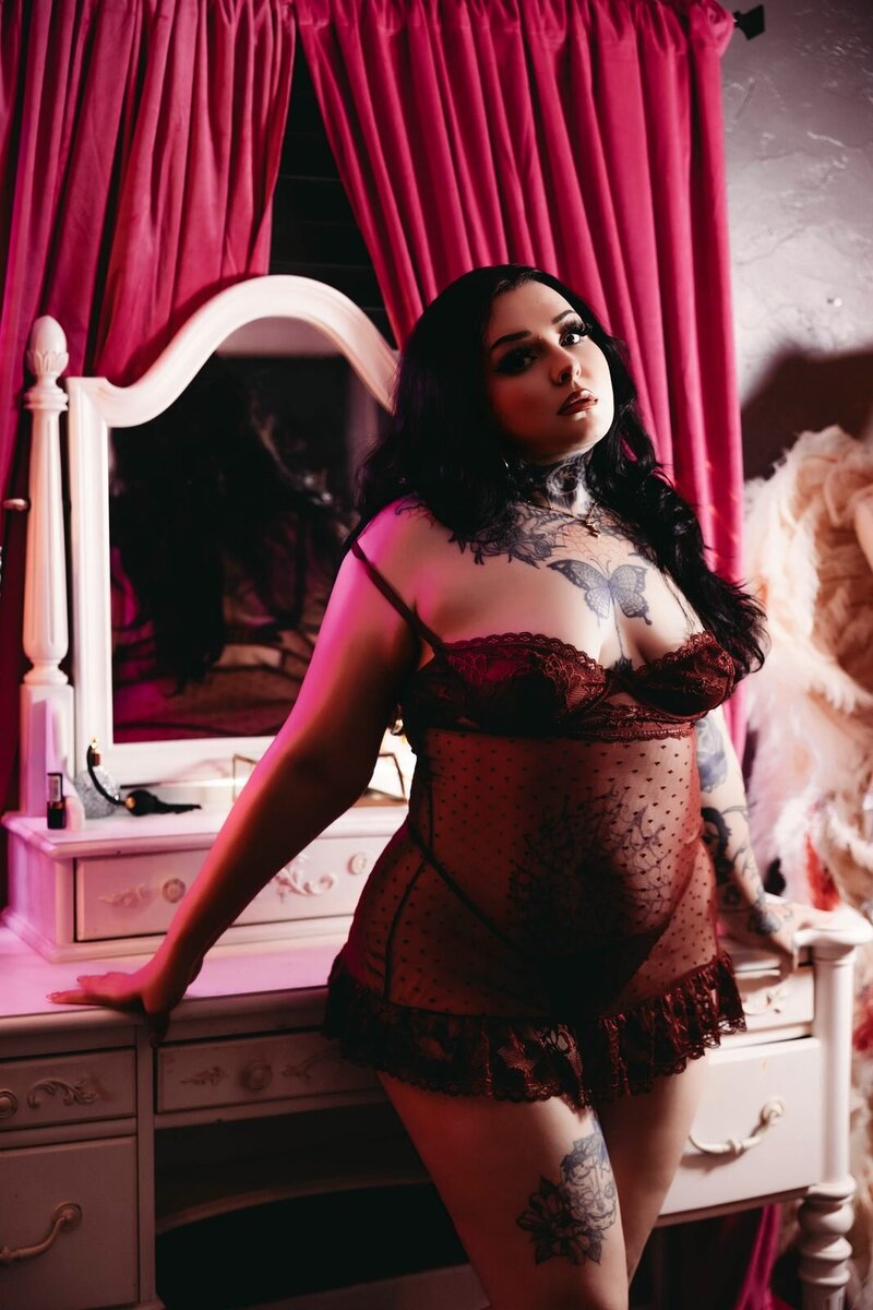 Pink vanity burgundy lace boudoir photo by Ivory & Lace Studios in Kingman, Arizona