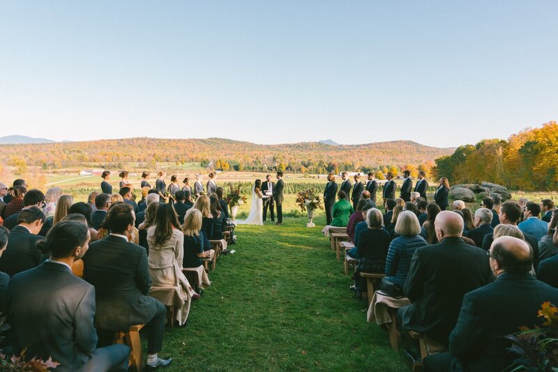 Set against the fiery backdrop of Vermont's peak autumn foliage, Elle and Jack’s wedding at Isham Family Farm was a perfect blend of elegance and personal flair.