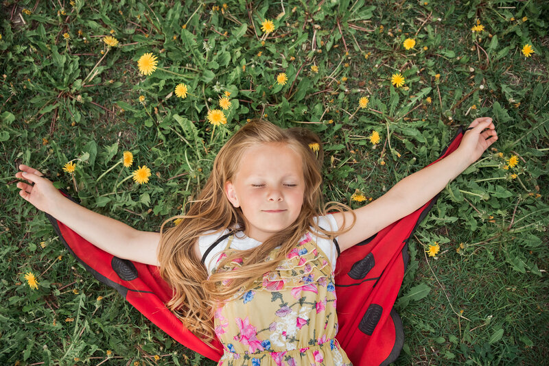 NYC Family Lifestyle Photographer Kim Lorraine Photography, New York City, Hoboken, nature photographer, daughter pictures, sister pictures, dress up, dress up photoshoot, dandelions, flower pictures, ladybug pictures