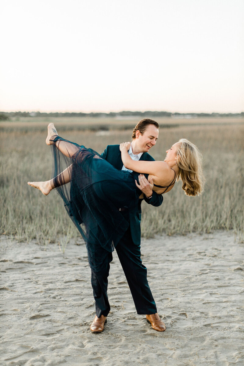 Lift Engagement photo on the Beach | Wrightsville Beach NC | The Axtells Photo and Film