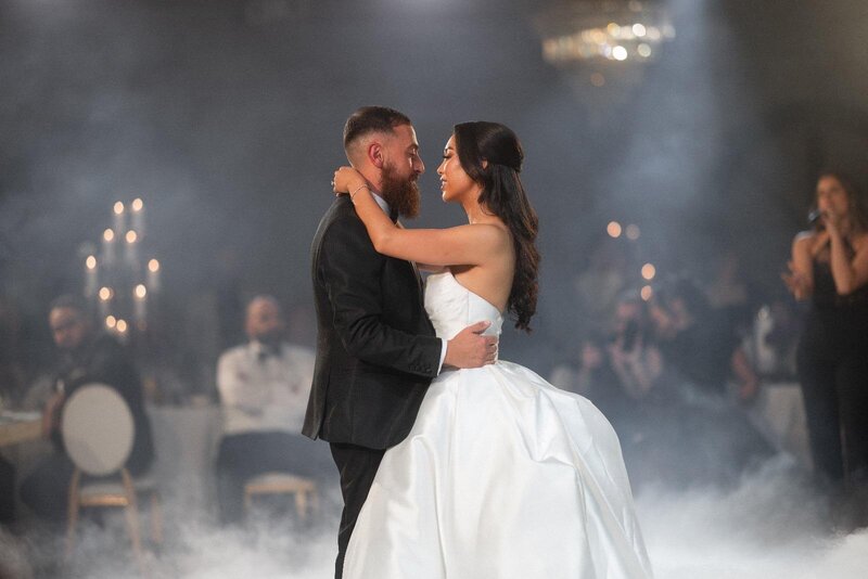Couple embracing in their first dance, illustrating LIMCO's philosophy of easy, flowing, and genuine dance movements.