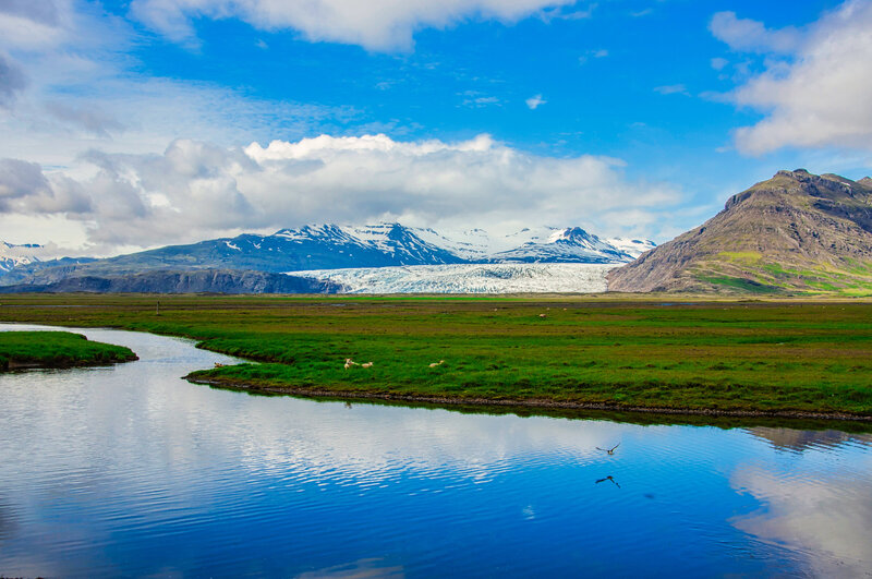 East iceland glacier landscape with sheep and a river