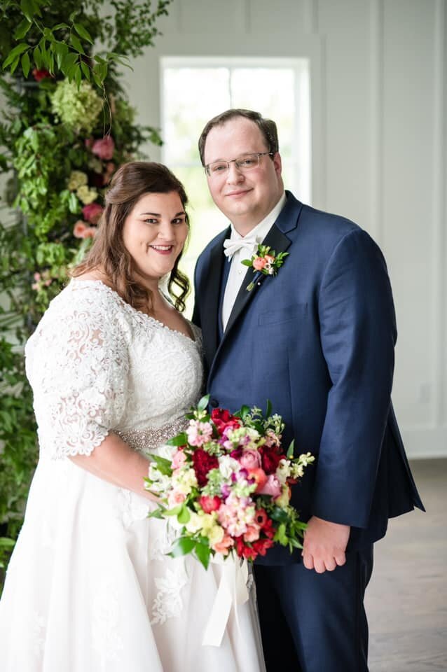 Bride and groom with bouquet