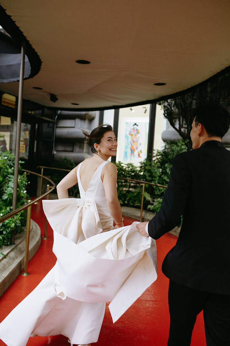 Bride and groom walk red carpet in San Francisco 