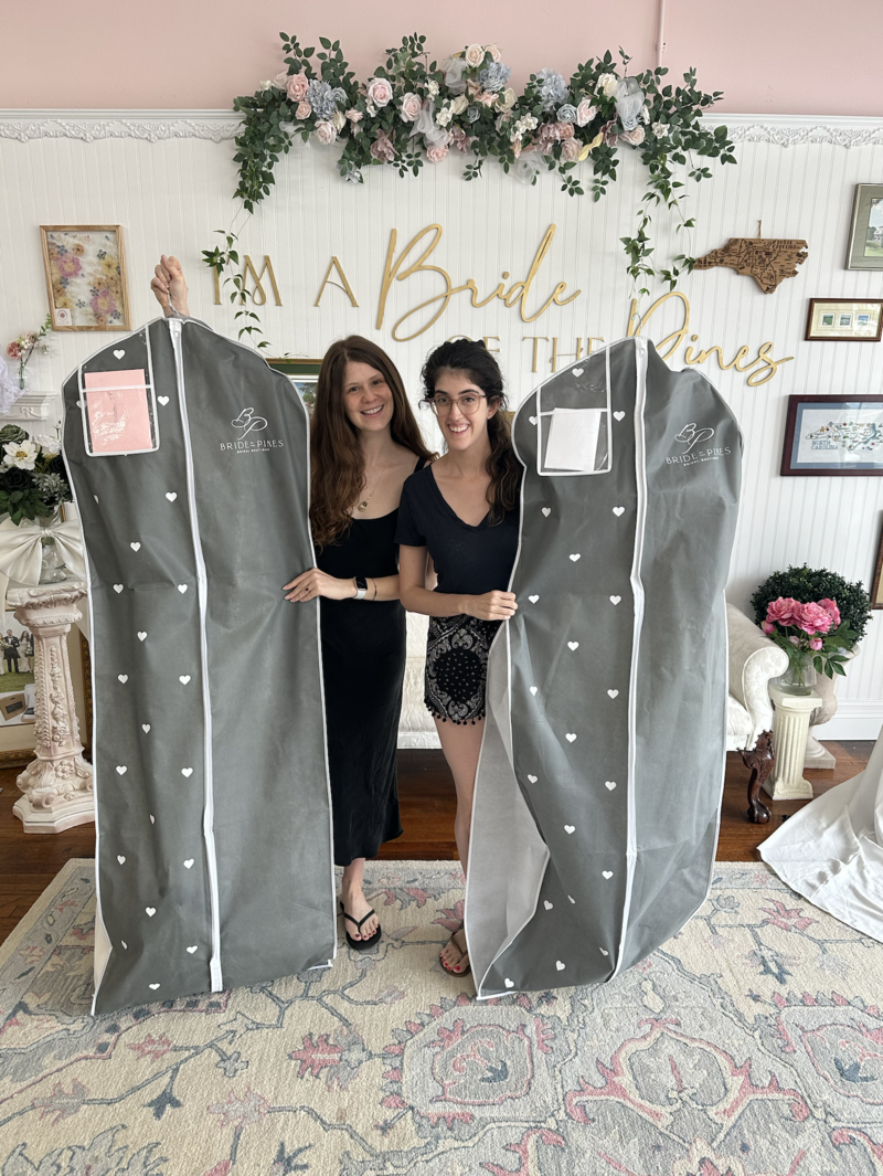 two brides taking their dream wedding dress home together in aberdeen nc