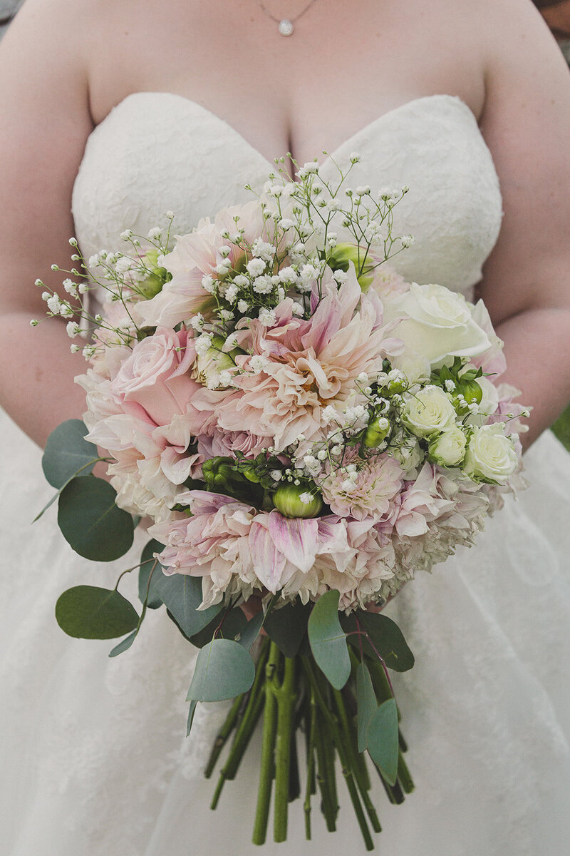 bride holds bouquet after wedding ceremony in las vegas