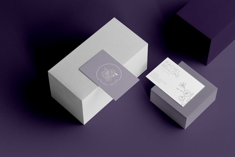 Business cards laying on top of plain boxes