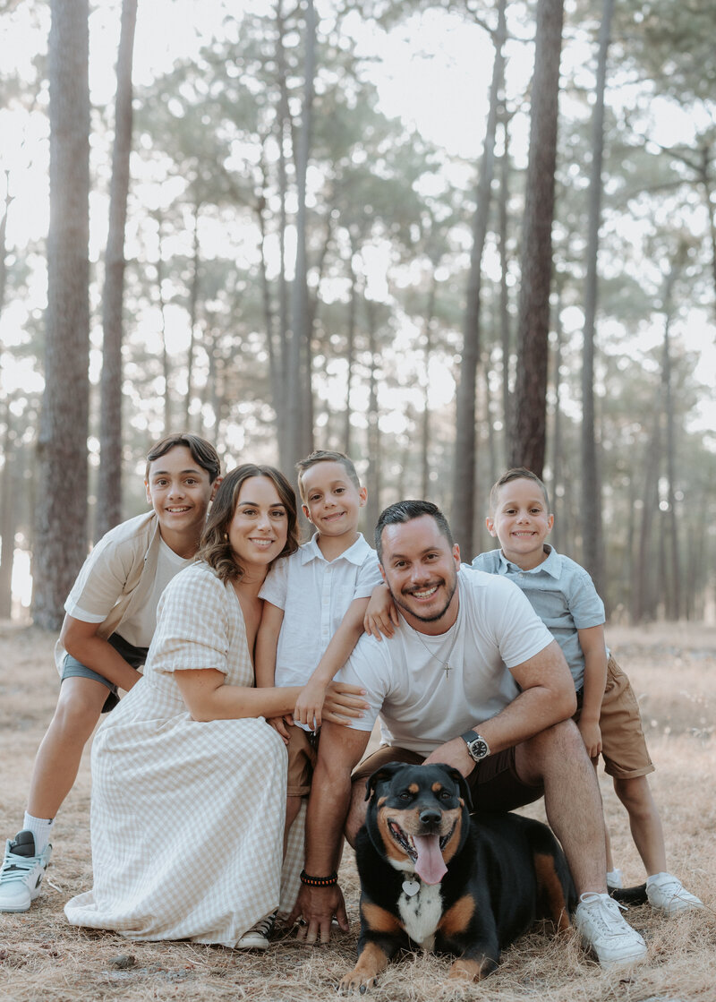 happy family with dog during outdoor family photography session in perth
