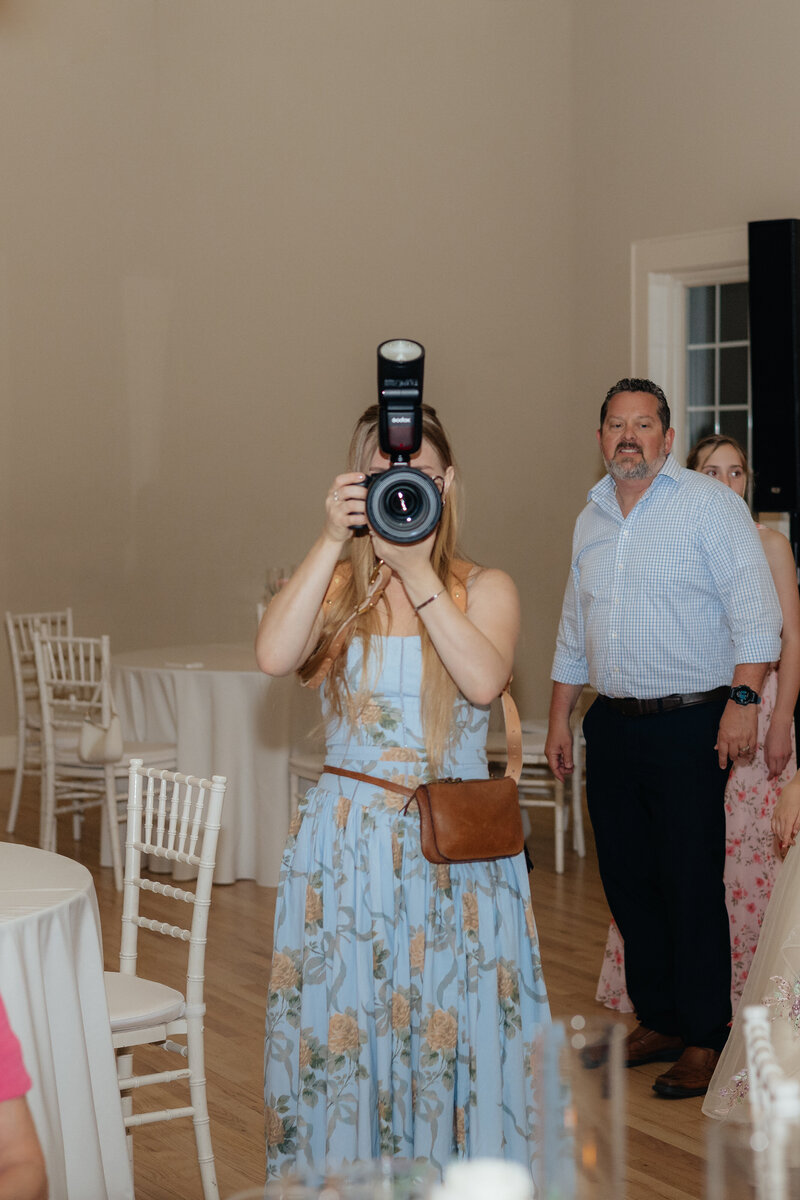 A woman smiling at the camera.