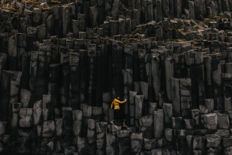 Black sand beach basalt columns elopement