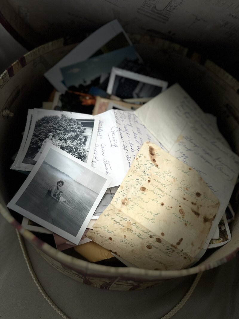 A pile of old pictures and letters