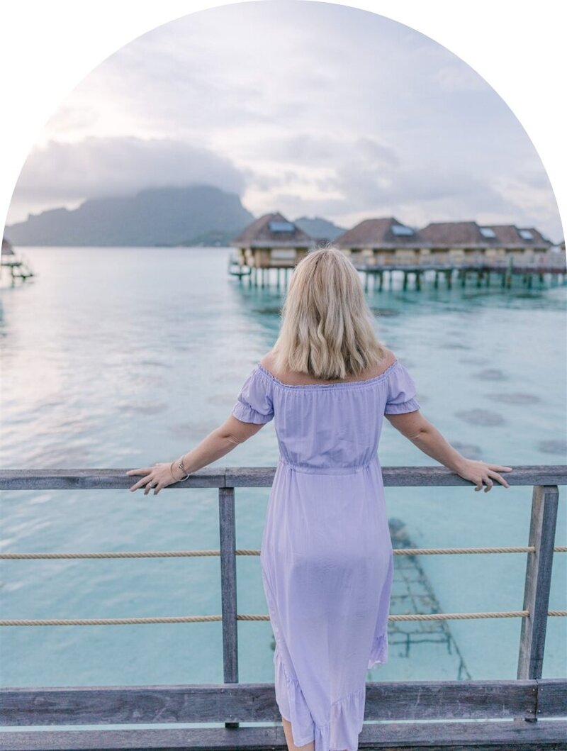 Dana, founder of DWD travel doing luxury vacation resort resource on a tropical island