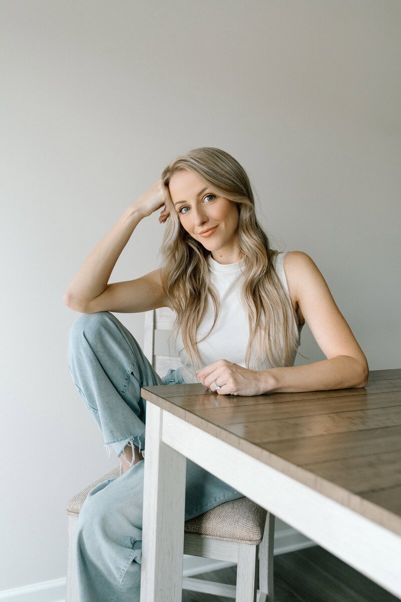 photographer sitting at table for a headshot