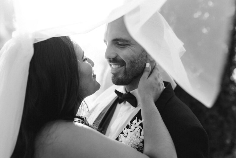Black and White Photo Bride and Groom Smiling