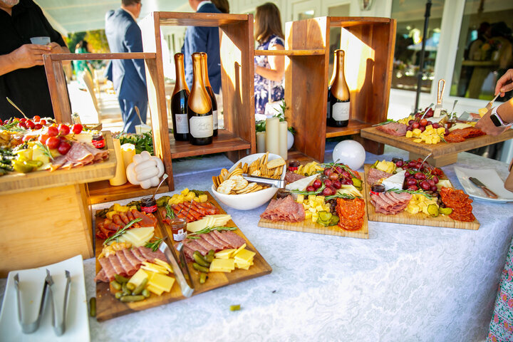 Chacuterie with meat, cheese and crackers.