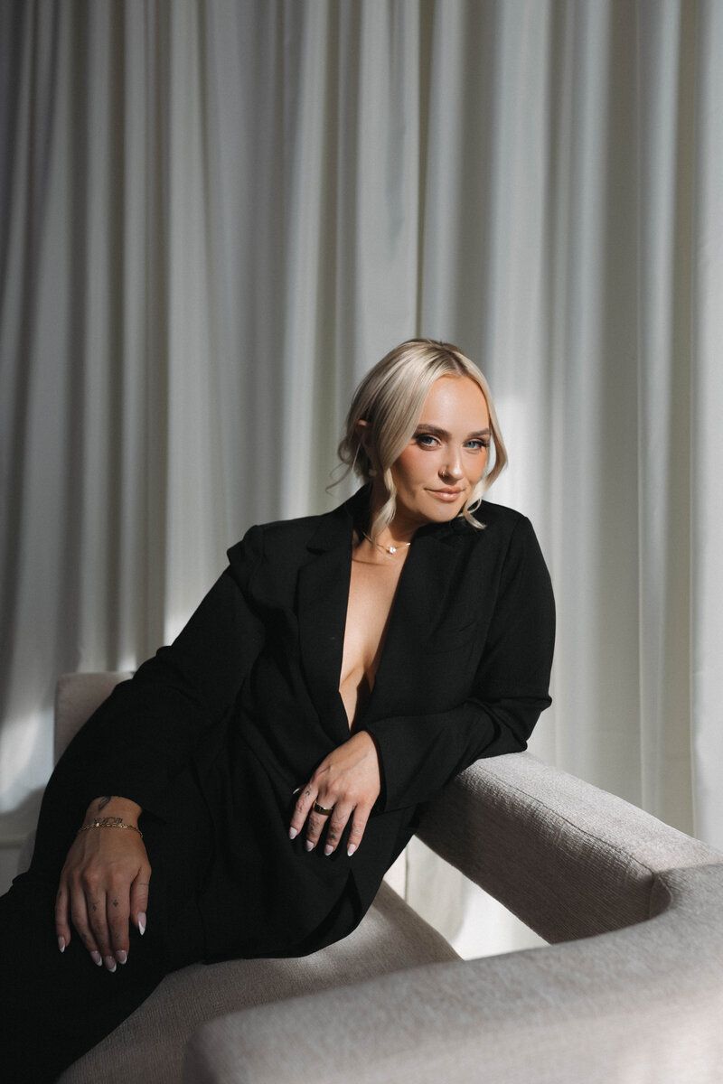 queer couple sharing a cocktail 