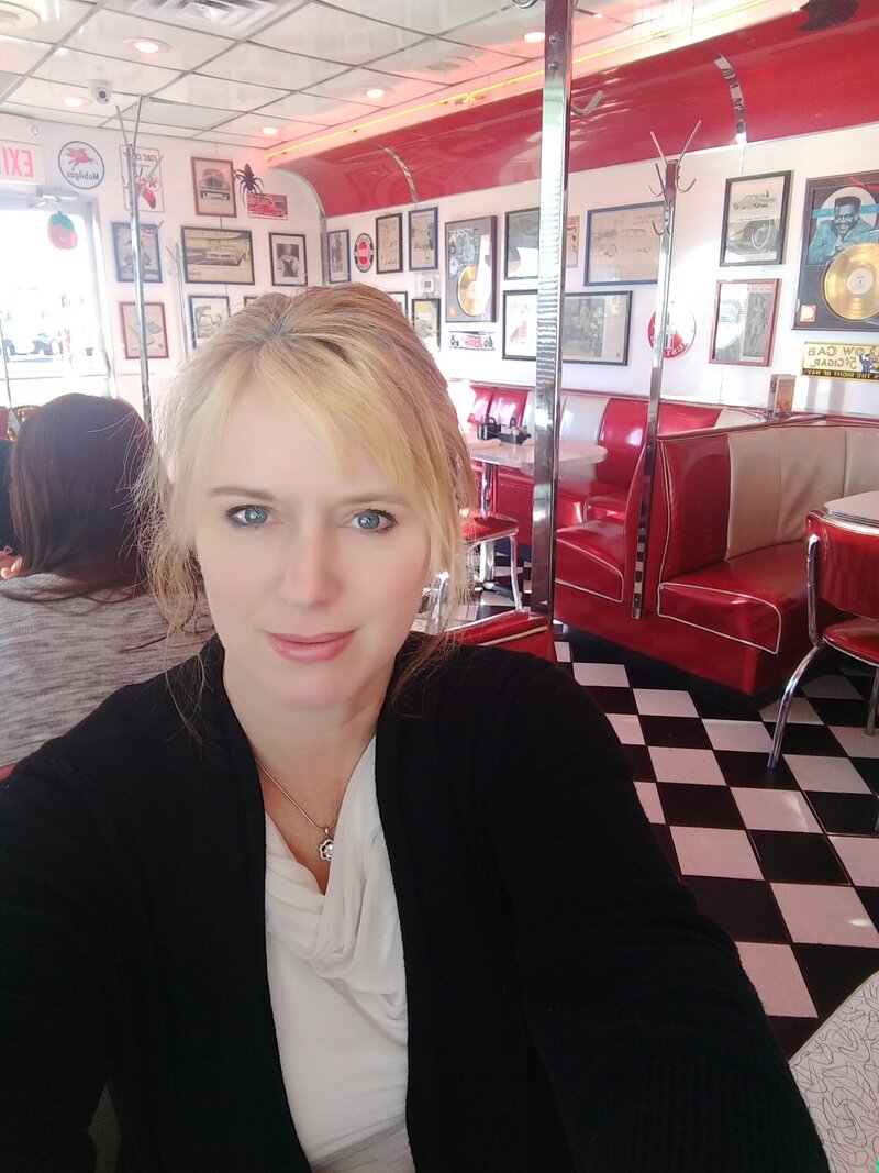 Smiling woman at a diner