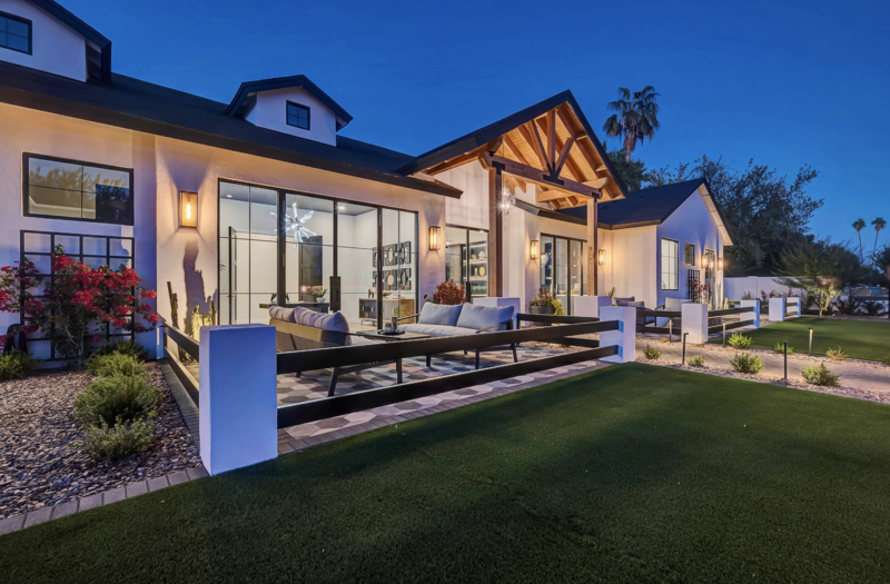 Ultra modern Phoenix, Arizona with energy-efficient, triple pane glass multi sliding patio doors that combine the in and outdoor living styles.