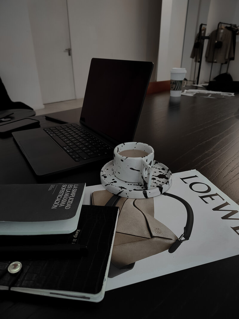 Woman writing a to-do list on a white frame