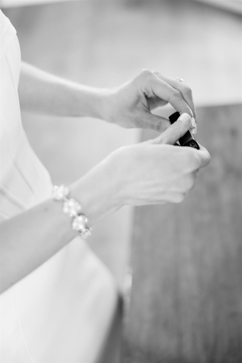 Black and white closeup of bride's lipstick on her wedding day by Orlando wedding photographer. 