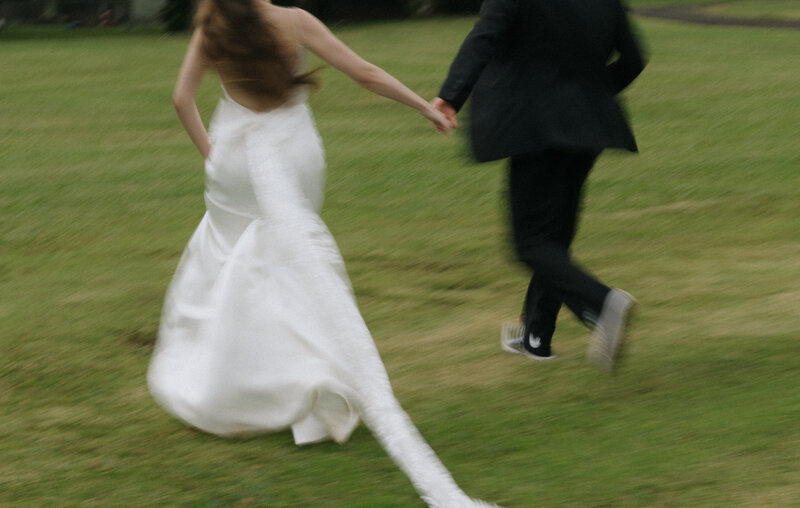 Bride and Groom running together