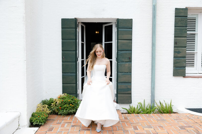 bride walking out of a door