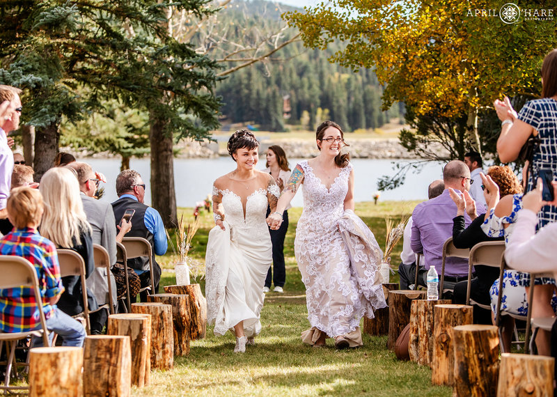 Beautiful same sex wedding during fall at Evergreen Barn