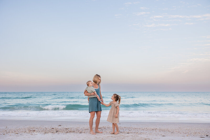 family photography at sunrise on Sunset Beach on Treasure Island