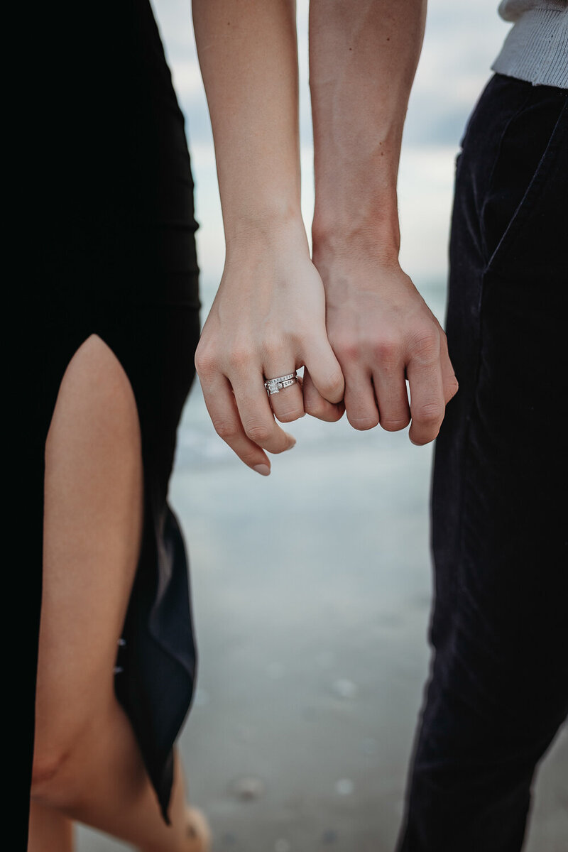 portrait of wedding rings on clearwater beach