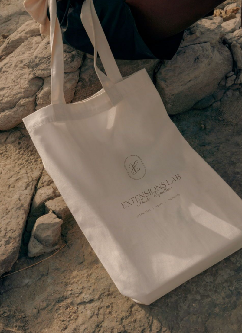 logo extensions lab sur un sac