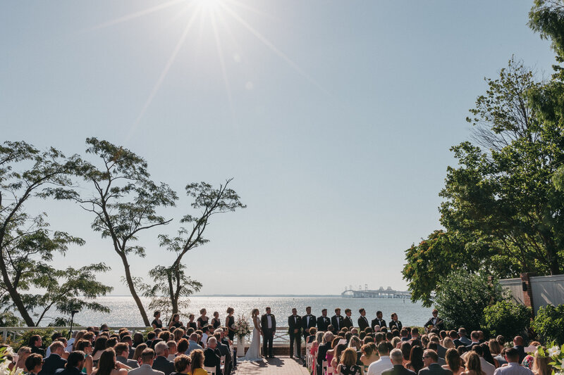 bride standing with bridesmaids