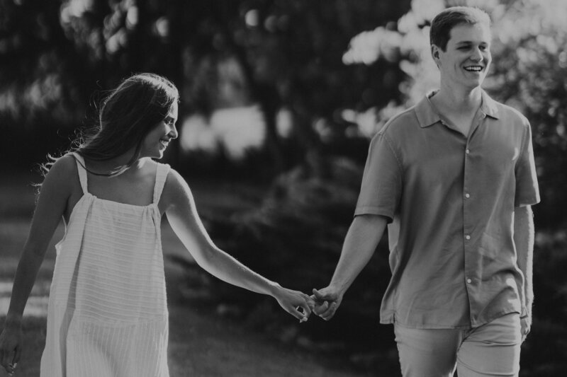 couple walking in field