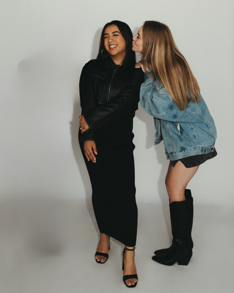 Hairstylists hugging and posing for the camera