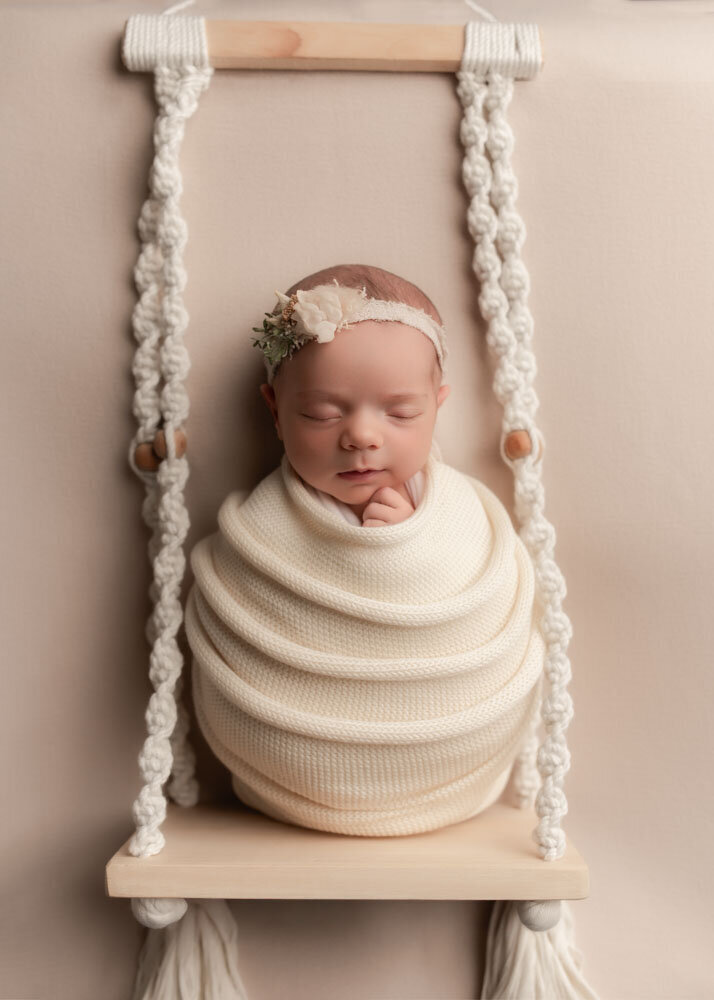 newborn-mini-session-swing-prop-vertical