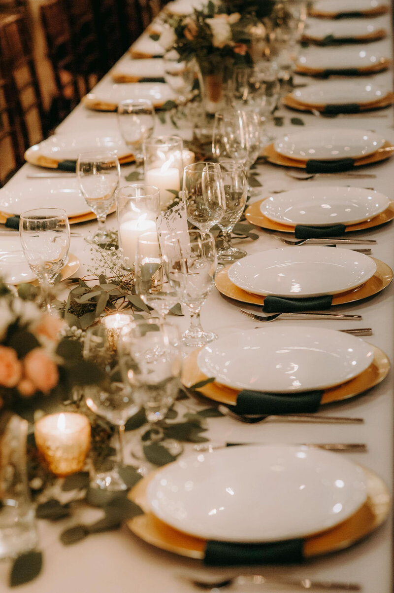 Reception table place settings designed by wedding planners in Raleigh