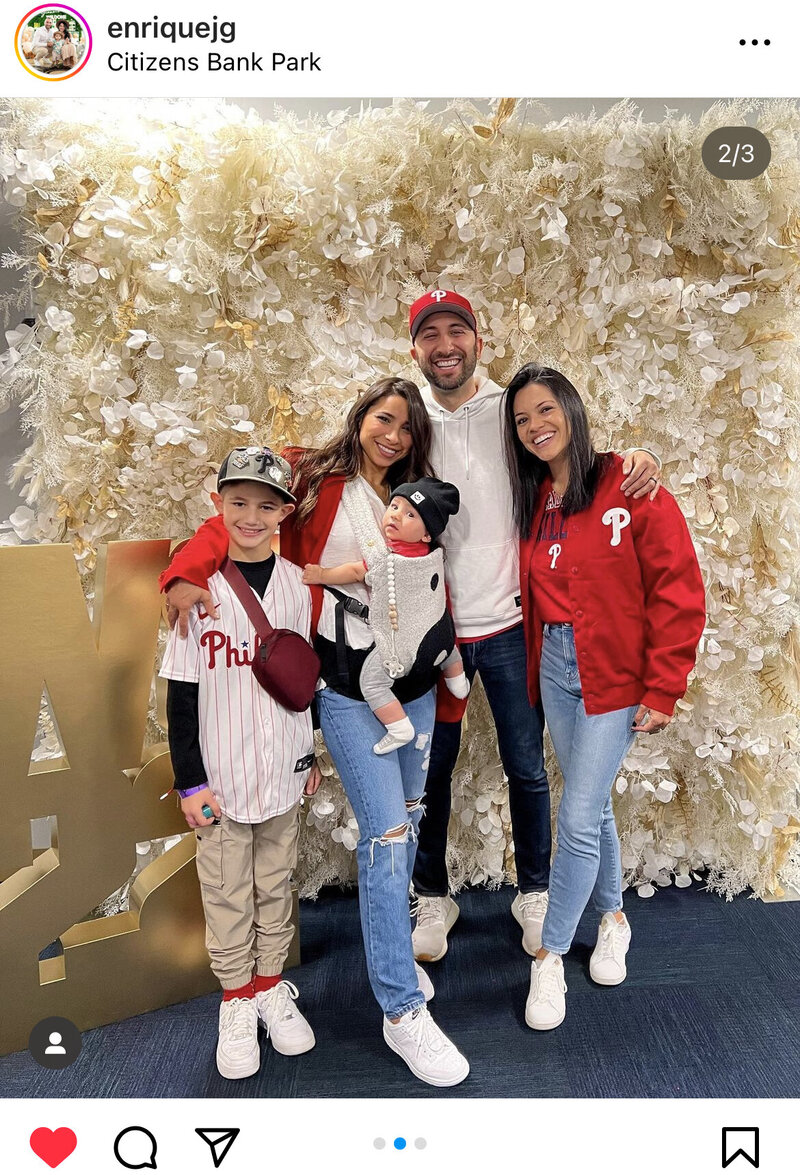 phillies family posing at the WS22