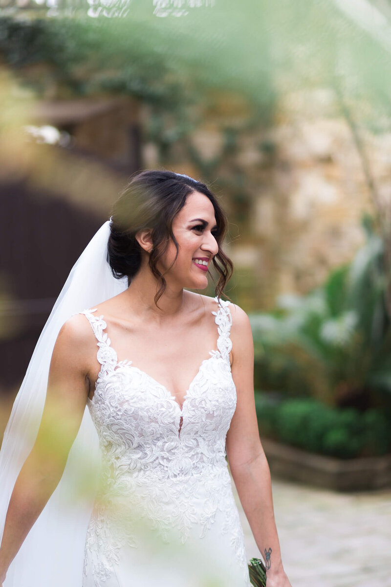 bride smiles on her wedding day at The Bell Tower on 34th in Houston by Swish and Click Photography