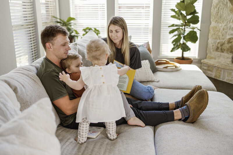 family reading books together in Carrollton texas