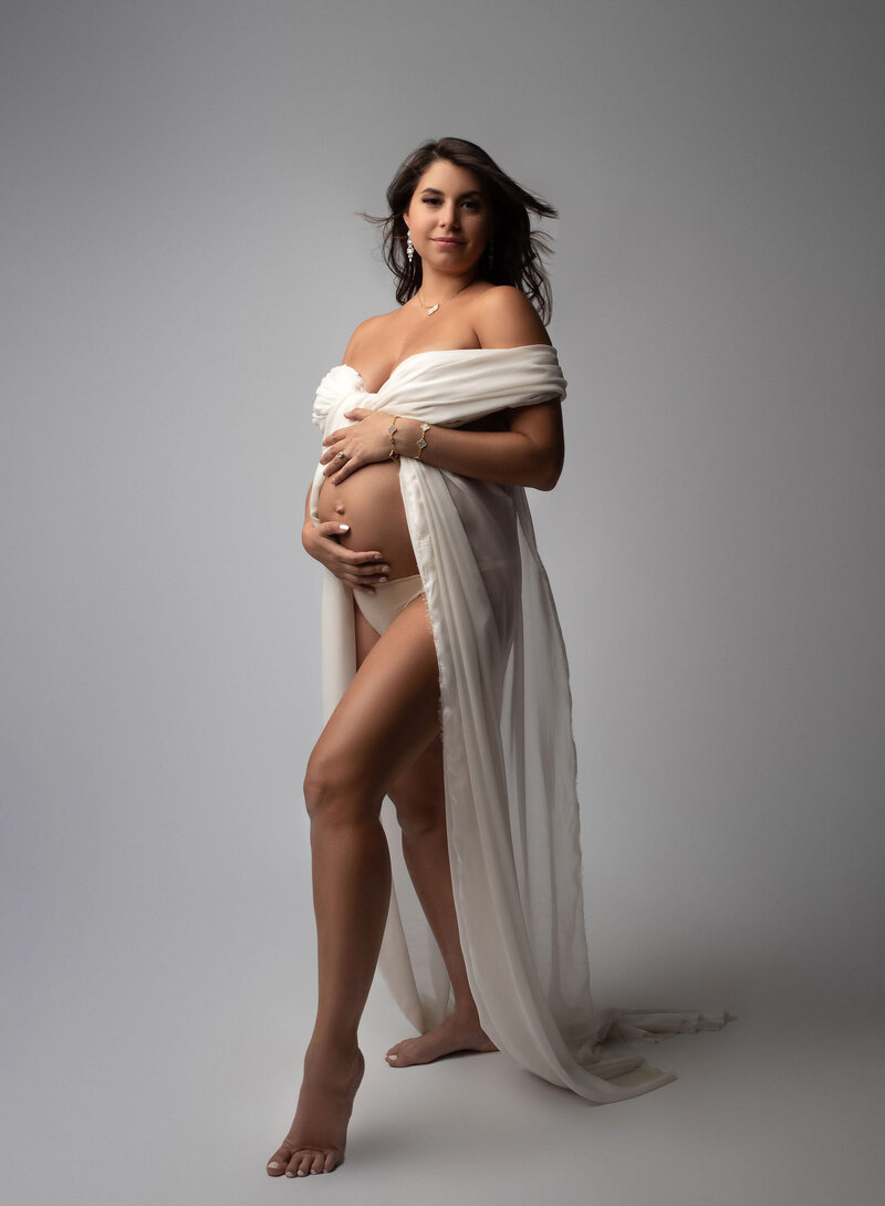 Capture the glow of pregnancy with stunning maternity photos by Drea S Photo. Serving Stamford, CT and surrounding areas. Book your session today