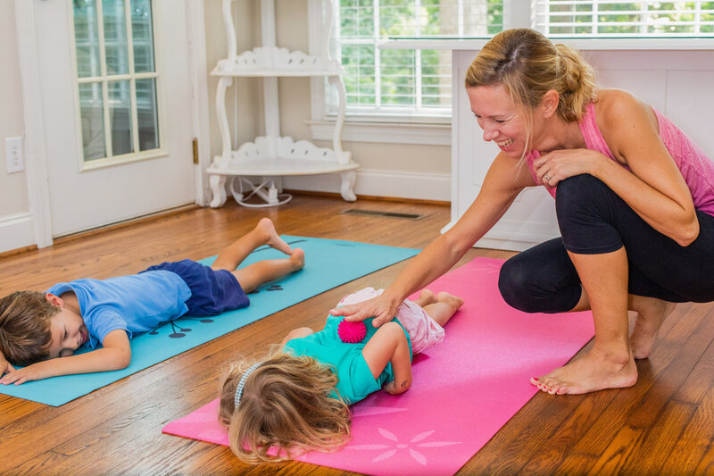 kids yoga teacher during a class for personal brand photo session with atlanta brand photography Laure photography