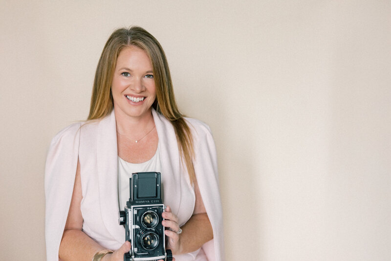 Charleston Wedding Photographer | Photographer holding a camera spinning around