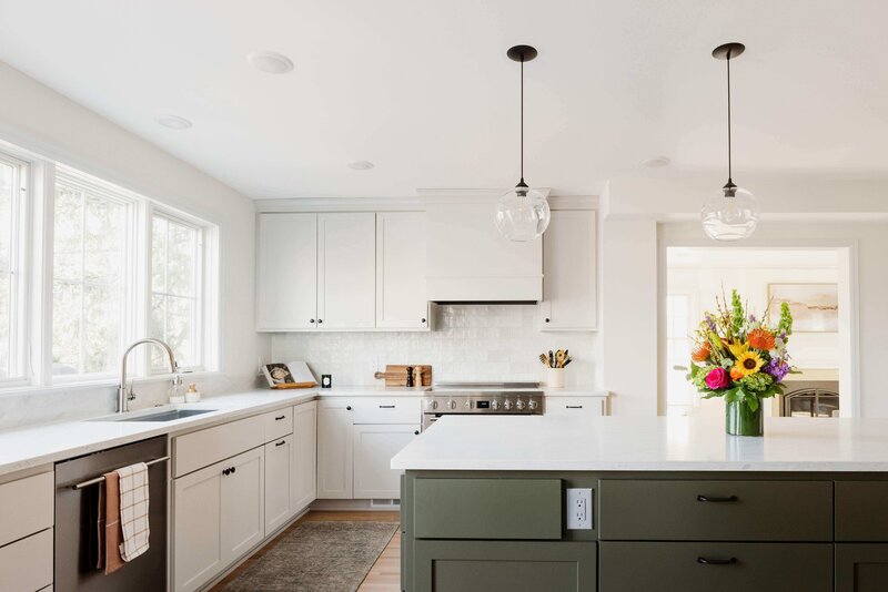 Kitchen Remodel Design Inspiration with Green Island White Countertops and White Cupboards