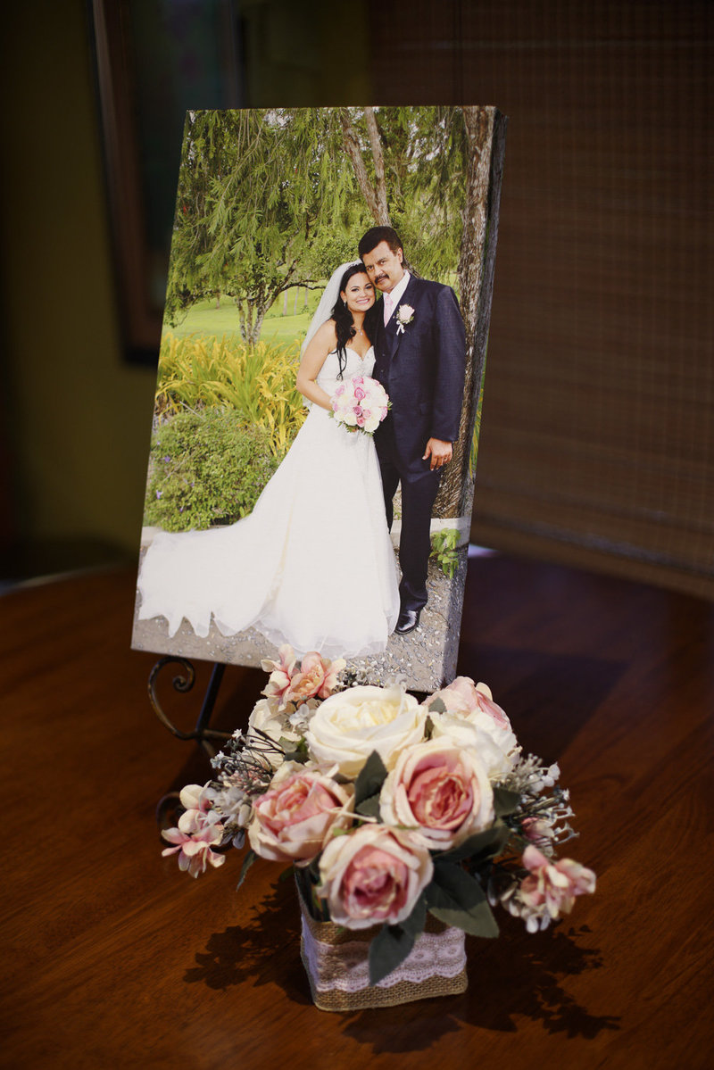Wedding canvas print with floral arrangement. By Ross Photography, Trinidad, W.I..