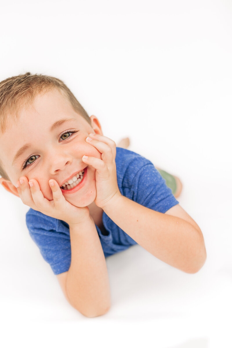 Asheville Personality Portraits with white backdrop with Asheville family photographer