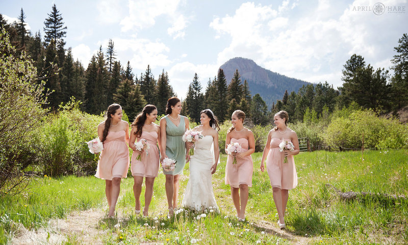 Bridesmaids wearing pink at Mountain View Ranch